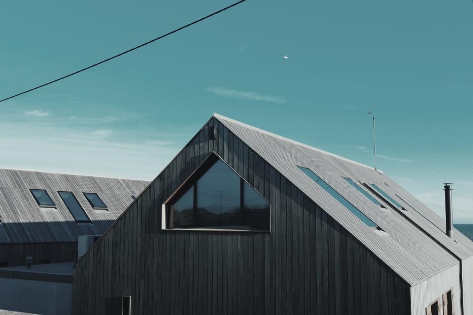 Modern house with dark metal roof